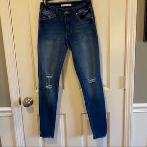 Kancan brand juniors dark wash distressed knees.